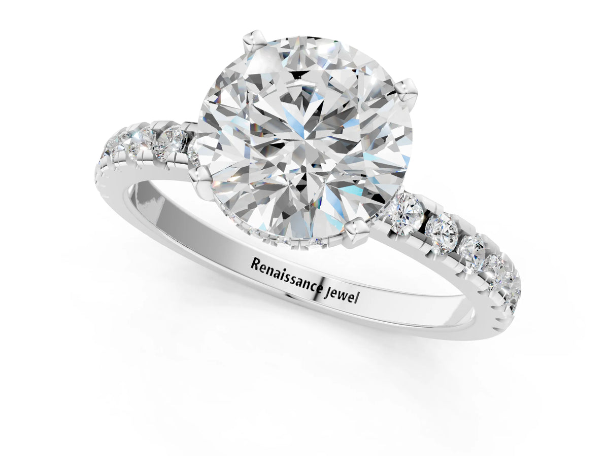 White gold Marquise Diamond Engagement Ring with Round Side Stones and Prong Setting
