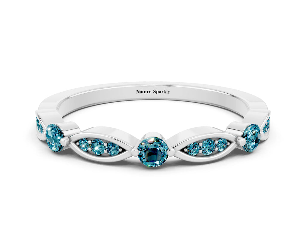 Alternating Marquise and Round Blue Topaz Milgrain Band in White gold with Bezel Setting