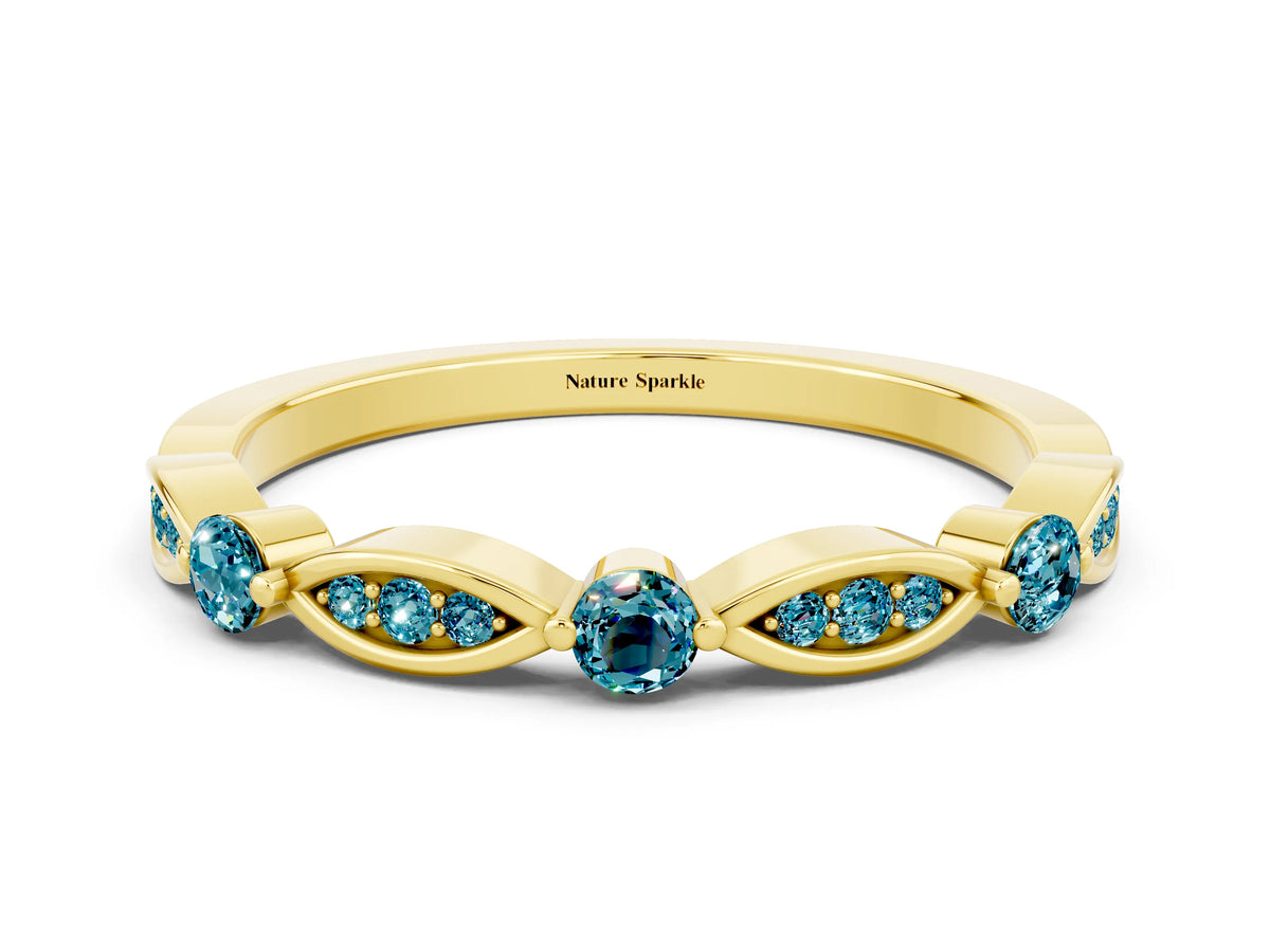 Alternating Marquise and Round Blue Topaz Milgrain Band in Yellow gold with Bezel Setting