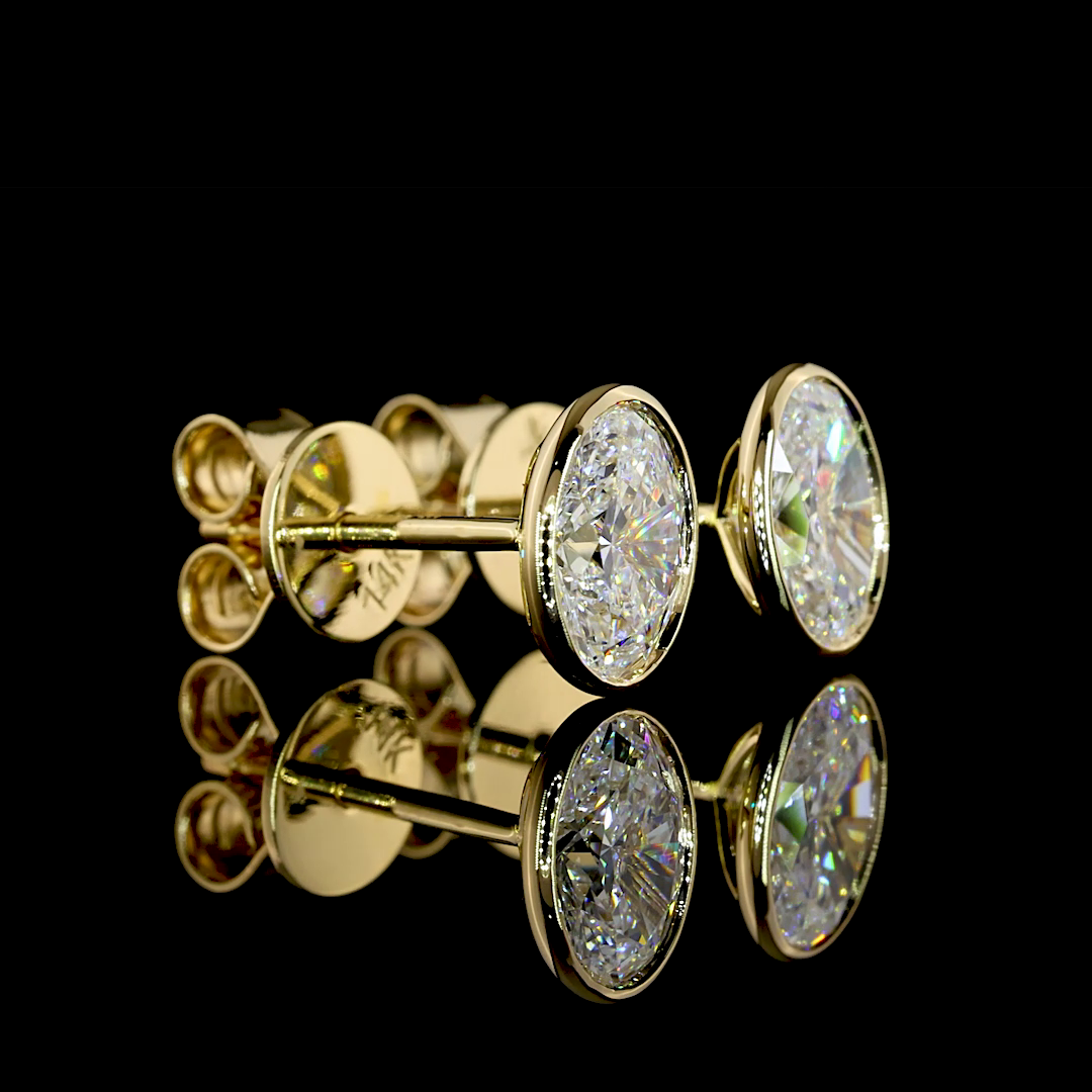 Yellow gold Diamond Studs · 1.09 ct