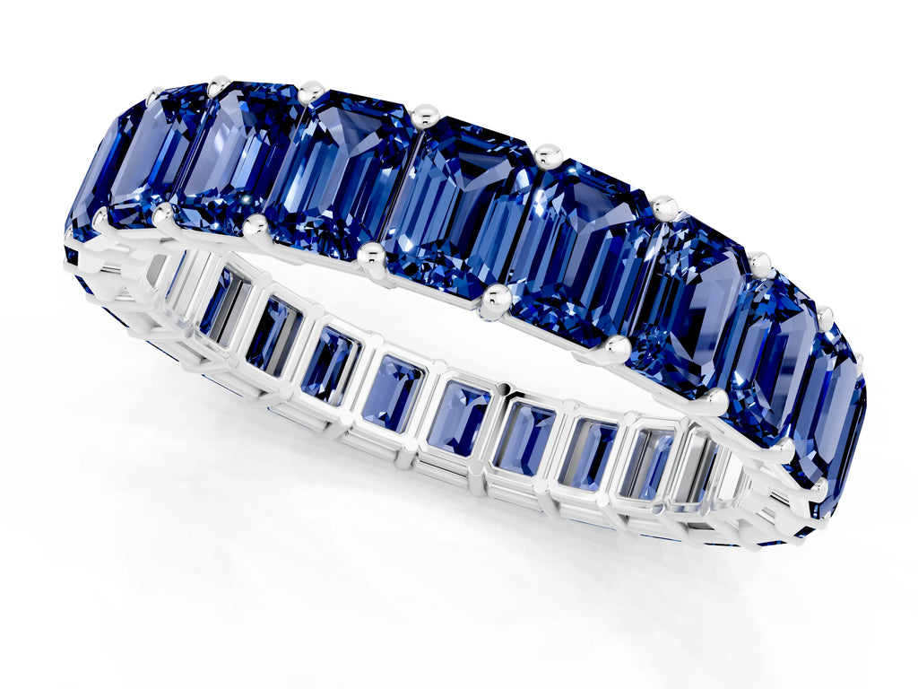 Emerald Cut Blue Sapphire Eternity Band in White gold with Aligned Shared Prong Setting