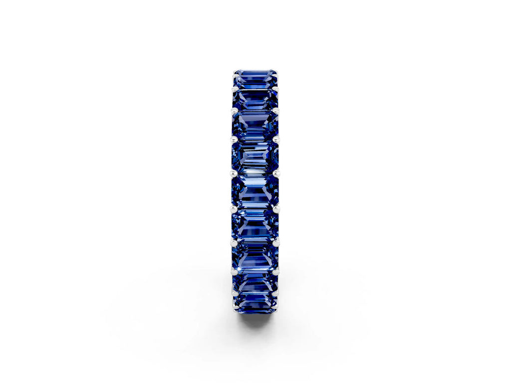 Emerald Cut Blue Sapphire Eternity Band in White gold with Aligned Shared Prong Setting