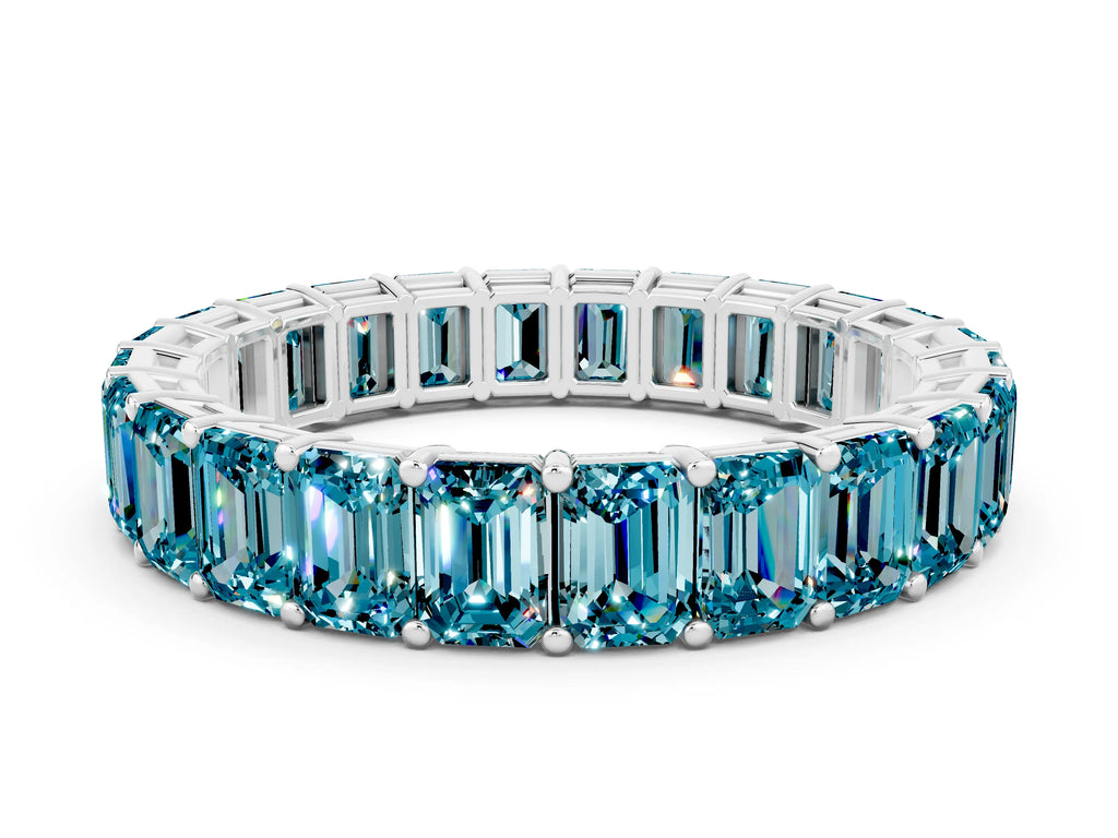Emerald Cut Blue Topaz Eternity Band in Silver with Aligned Shared Prong Setting