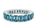 Emerald Cut Blue Topaz Eternity Band in Silver with Aligned Shared Prong Setting