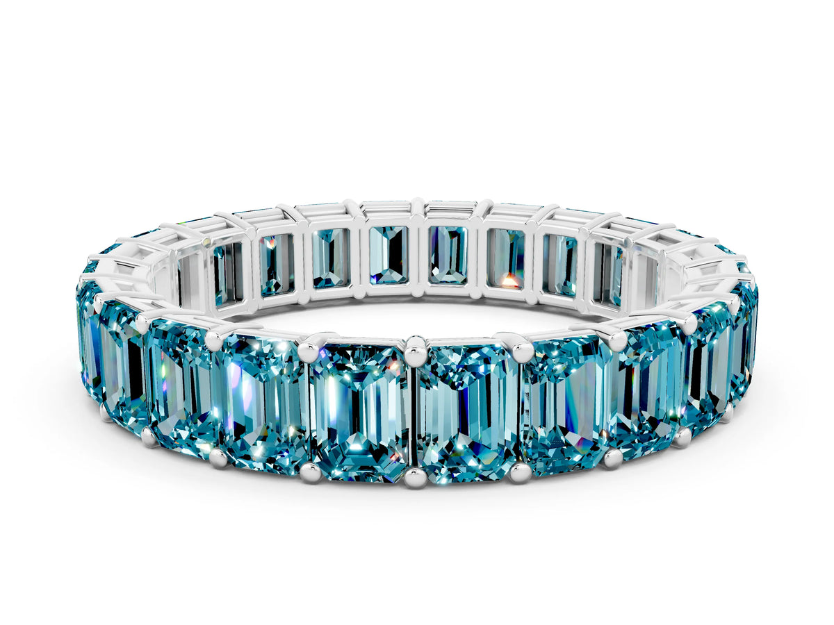 Emerald Cut Blue Topaz Eternity Band in Silver with Aligned Shared Prong Setting