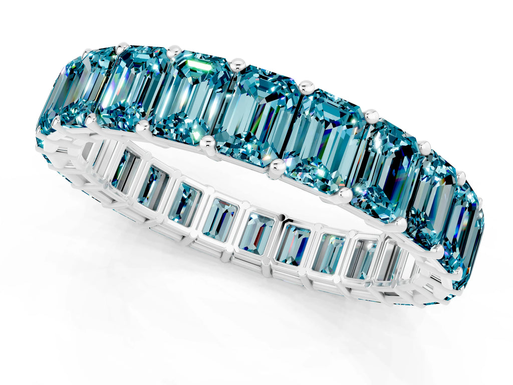 Emerald Cut Blue Topaz Eternity Band in Silver with Aligned Shared Prong Setting