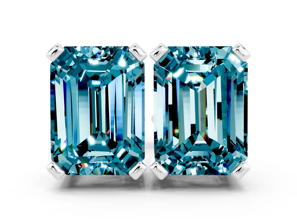 Emerald Cut Blue Topaz Stud Earrings in White gold with Basket Setting