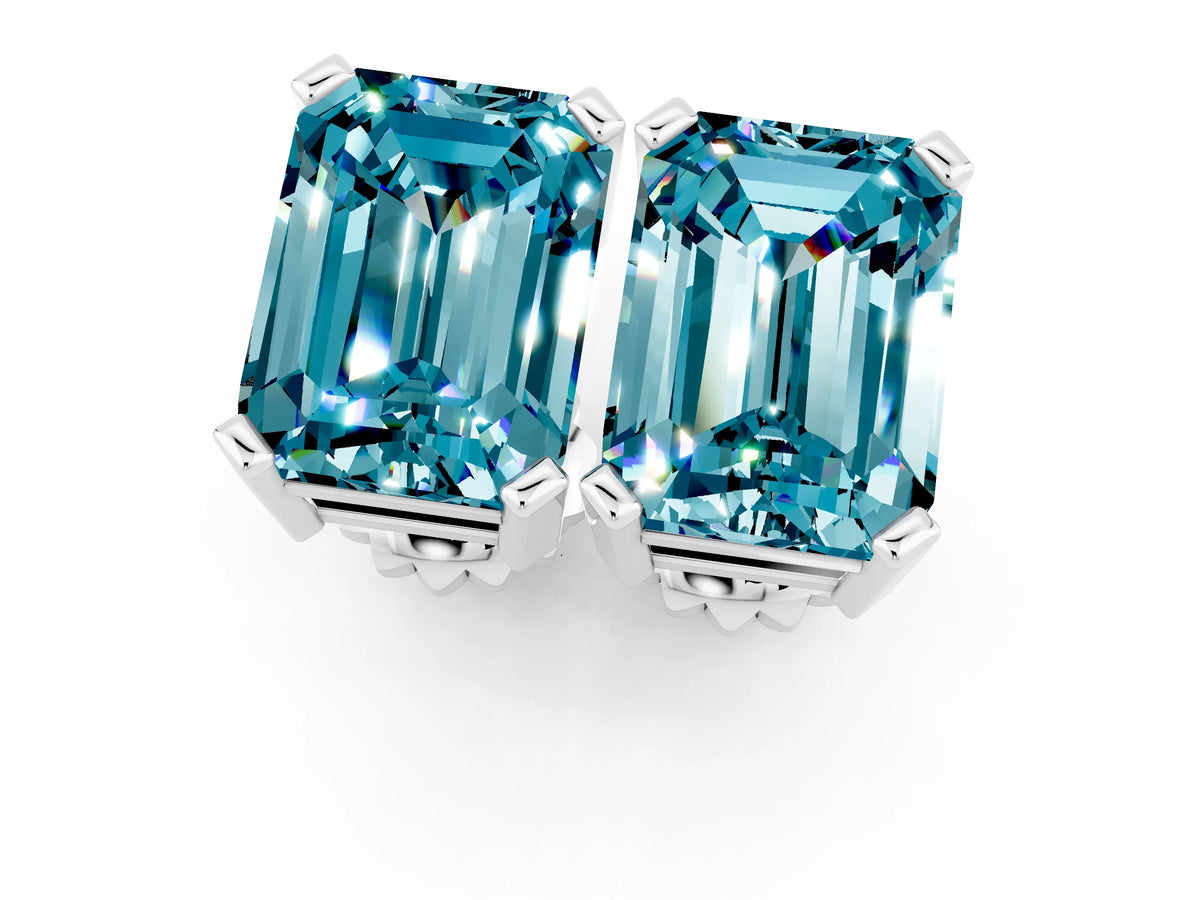 Emerald Cut Blue Topaz Stud Earrings in White gold with Basket Setting