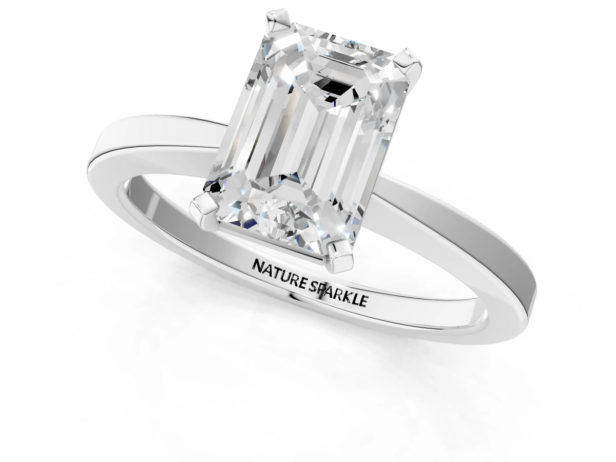 Emerald Cut Diamond Solitaire Engagement Ring in White gold with Prong Setting