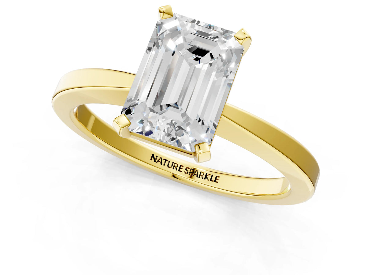Emerald Cut Diamond Solitaire Engagement Ring in Yellow gold with Prong Setting