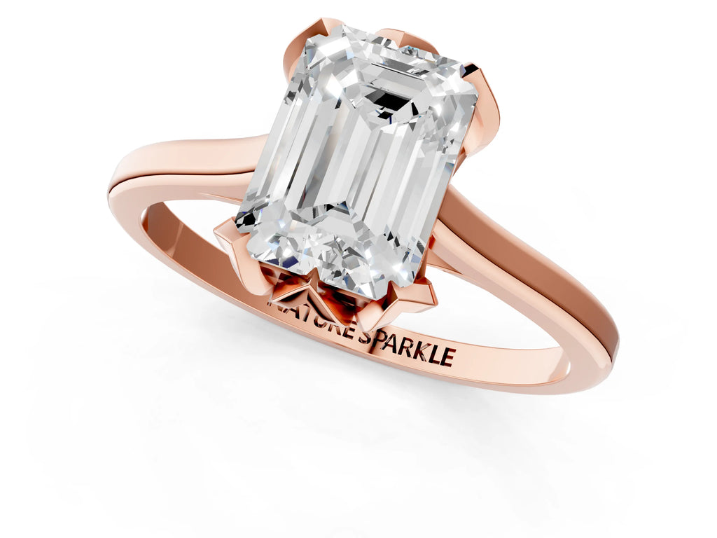Emerald Cut Diamond Solitaire Ring in Rose gold with Flower Prong Setting