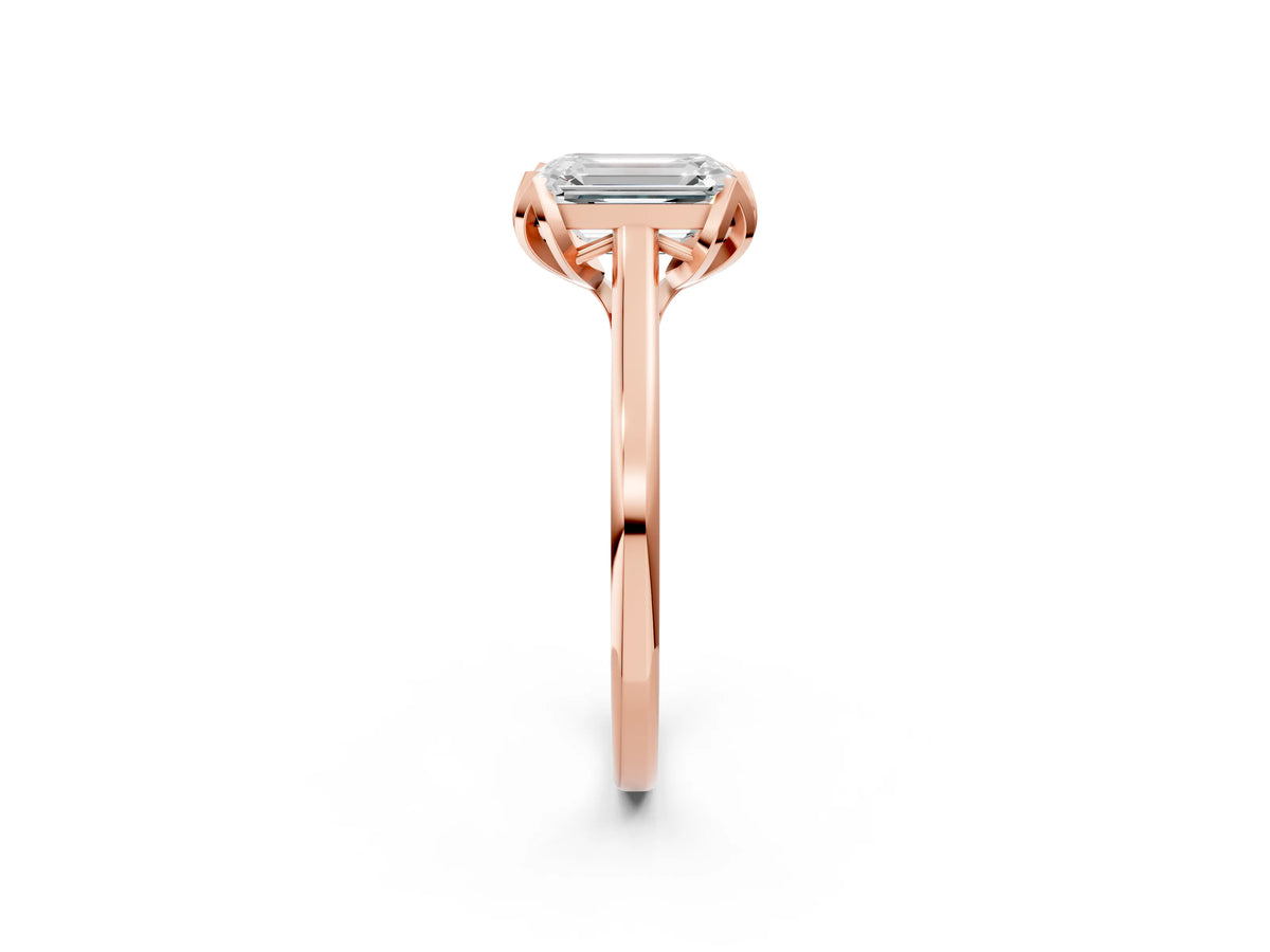 Emerald Cut Diamond Solitaire Ring in Rose gold with Flower Prong Setting