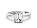 Emerald Cut Diamond Solitaire Ring in White gold with Prong Setting and Rounded Band