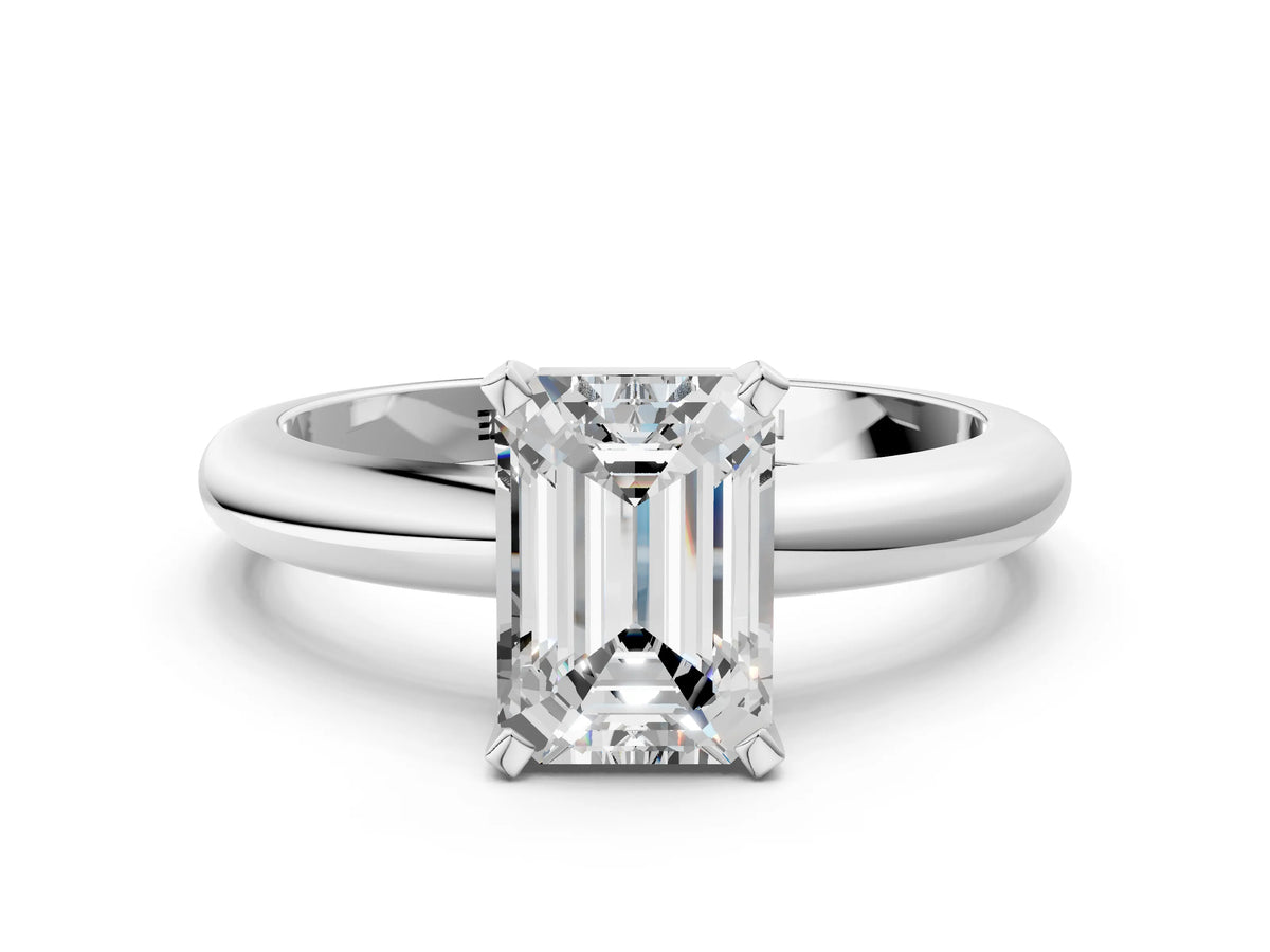 Emerald Cut Diamond Solitaire Ring in White gold with Prong Setting and Rounded Band