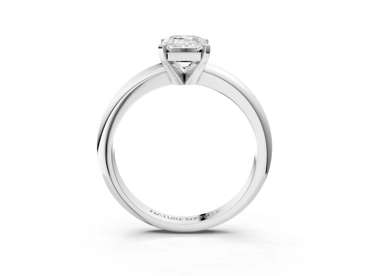 Emerald Cut Diamond Solitaire Ring in White gold with Prong Setting and Rounded Band