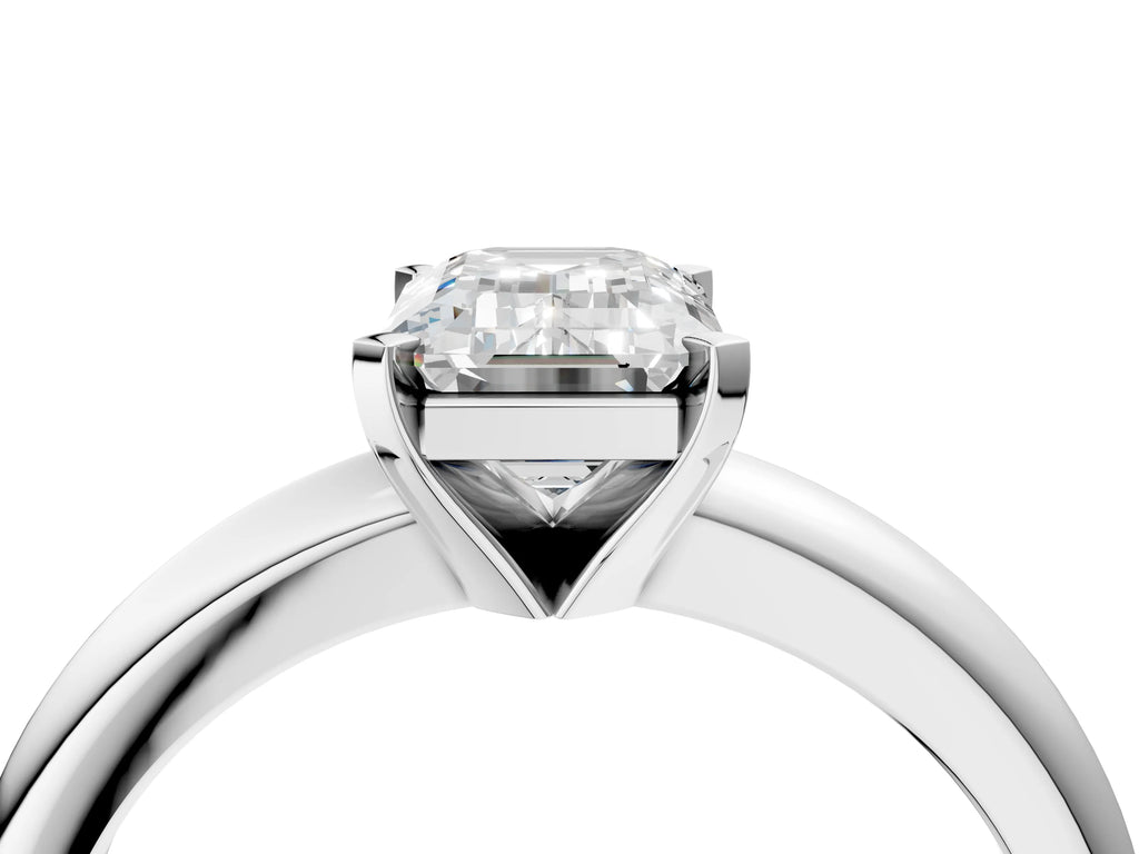 Emerald Cut Diamond Solitaire Ring in White gold with Prong Setting and Rounded Band