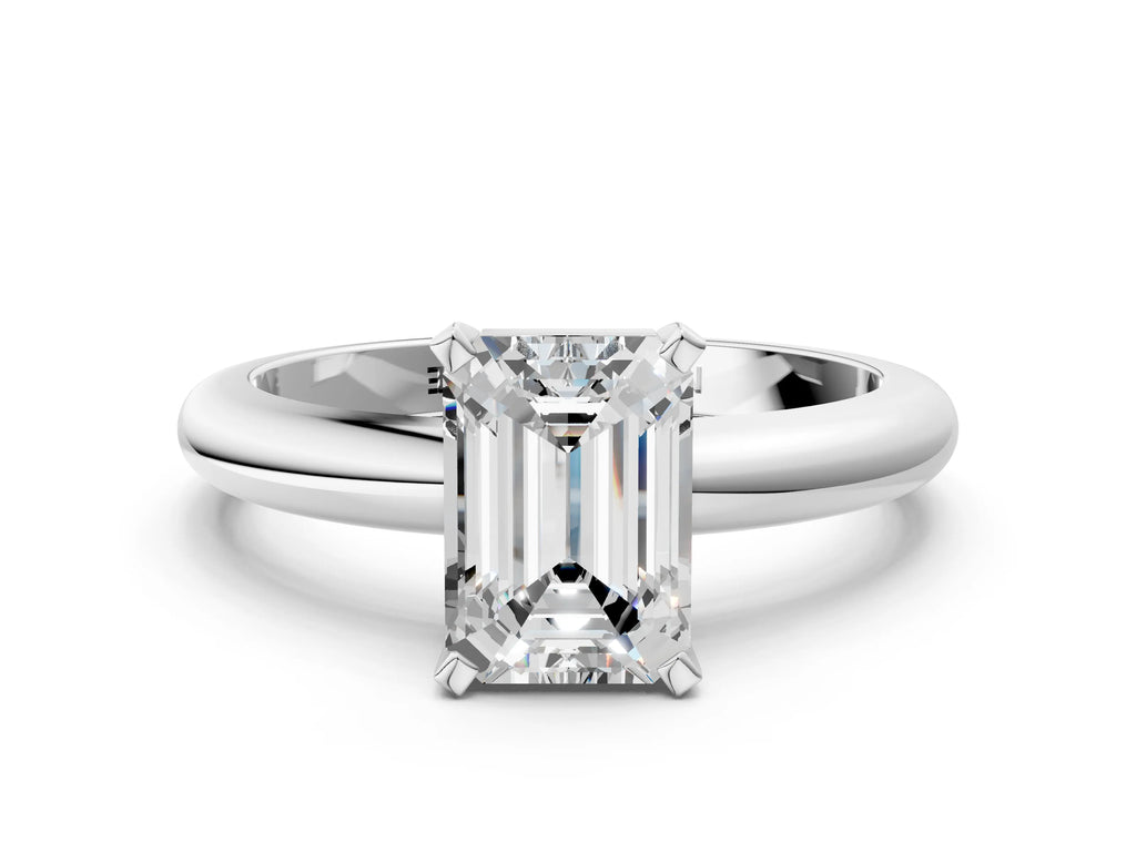 Emerald Cut Diamond Solitaire Ring in Silver with Prong Setting and Rounded Band