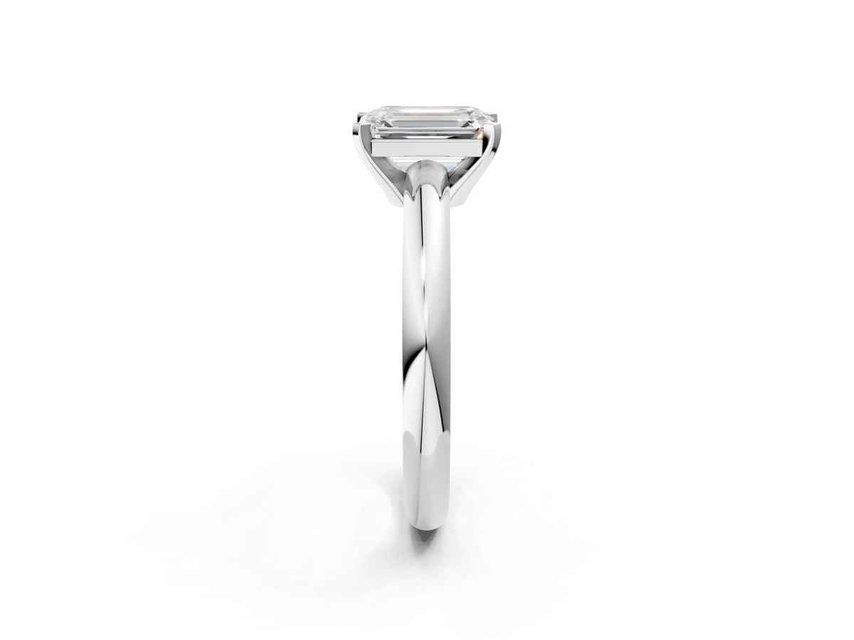 Emerald Cut Diamond Solitaire Ring in Silver with Prong Setting and Rounded Band