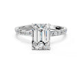Emerald Cut Diamond Solitaire Ring in Silver with Round Pavé Band