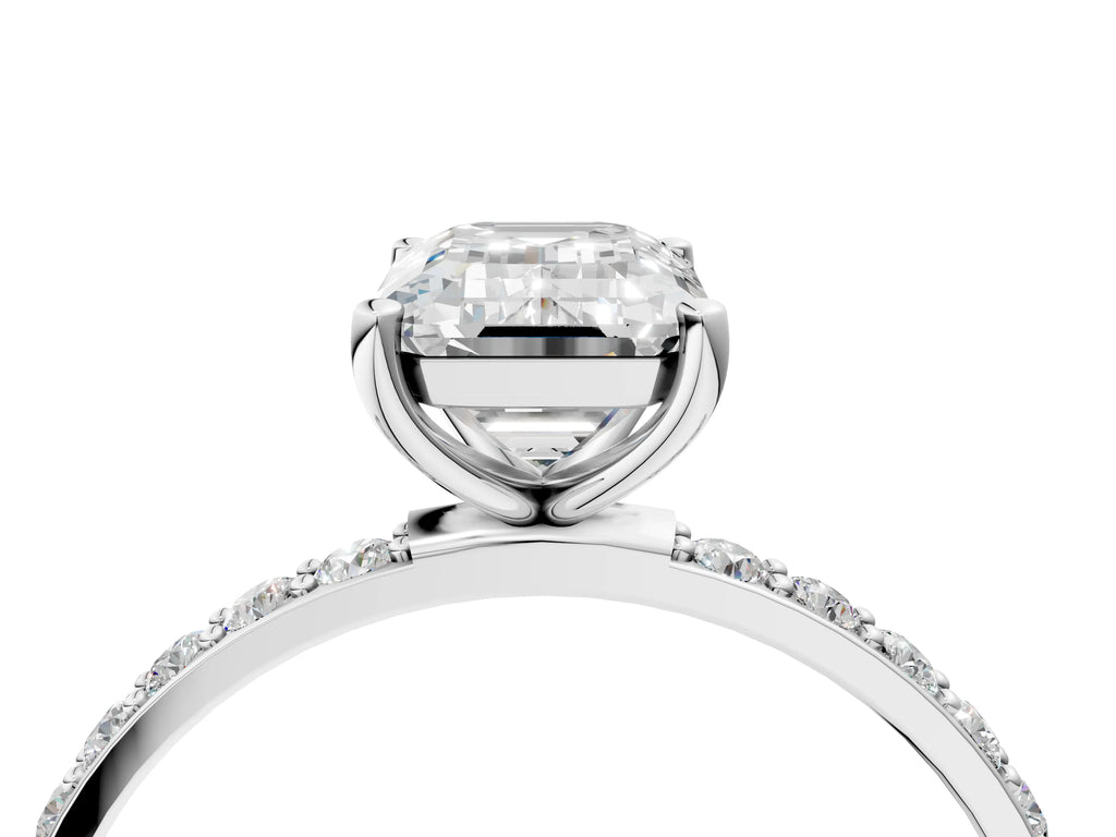 Emerald Cut Diamond Solitaire Ring in Silver with Round Pavé Band