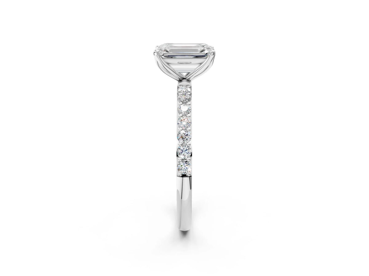 Emerald Cut Diamond Solitaire Ring in Silver with Round Shared Prong Pavé Band