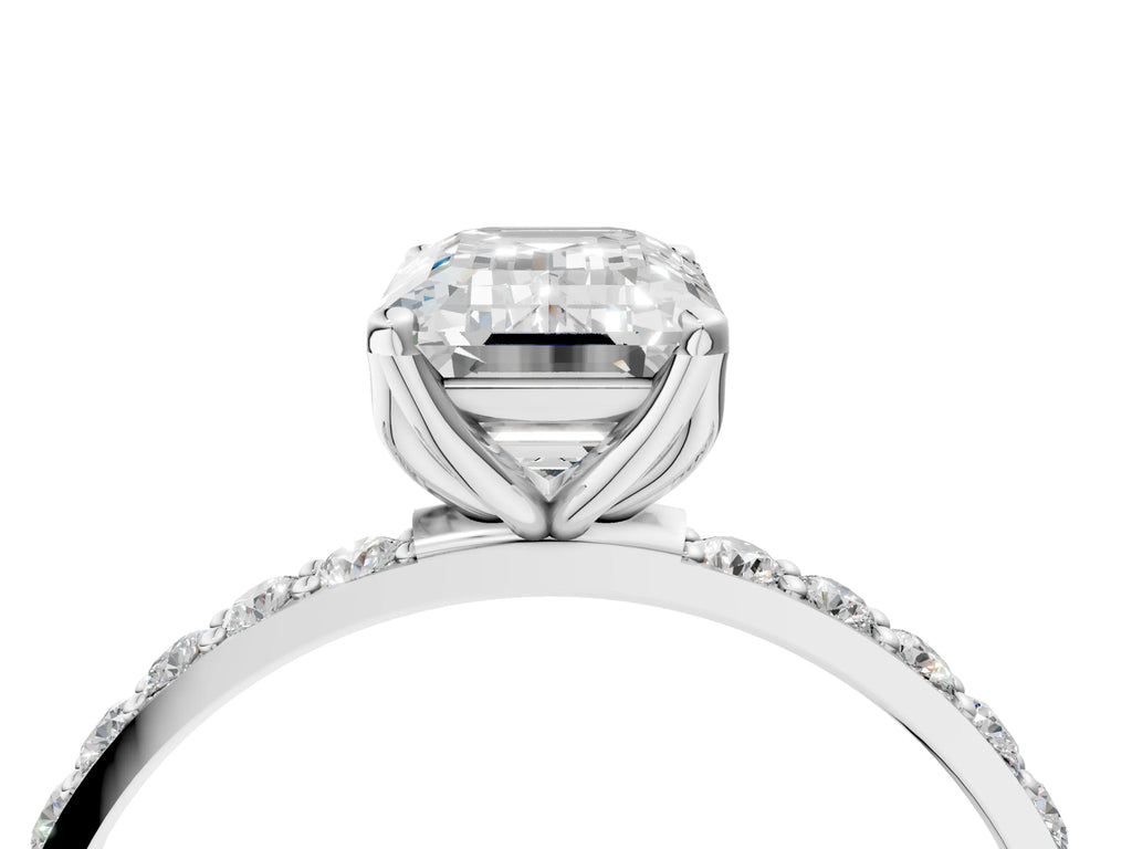 Emerald Cut Diamond Solitaire Ring in White gold with Round Shared Prong Pavé Band