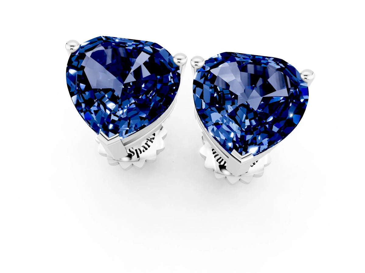 Heart Cut Blue Sapphire Stud Earrings in White gold with Basket Setting