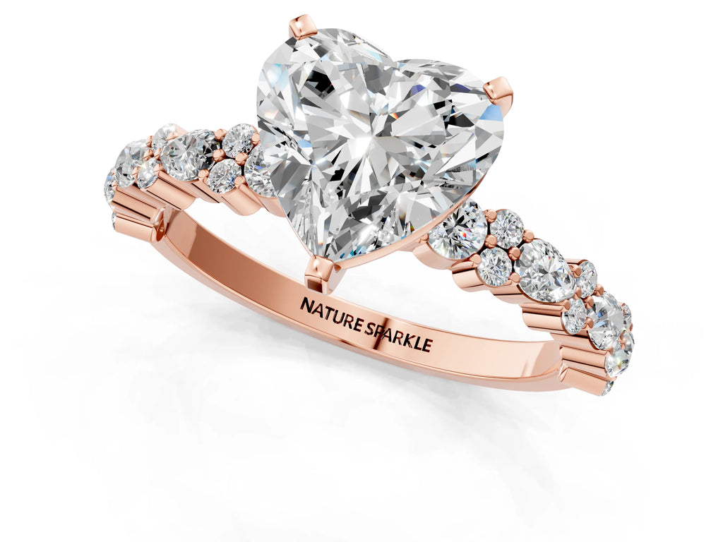 Heart Cut Diamond Solitaire Ring in Rose gold with Pear and Round Cluster Band