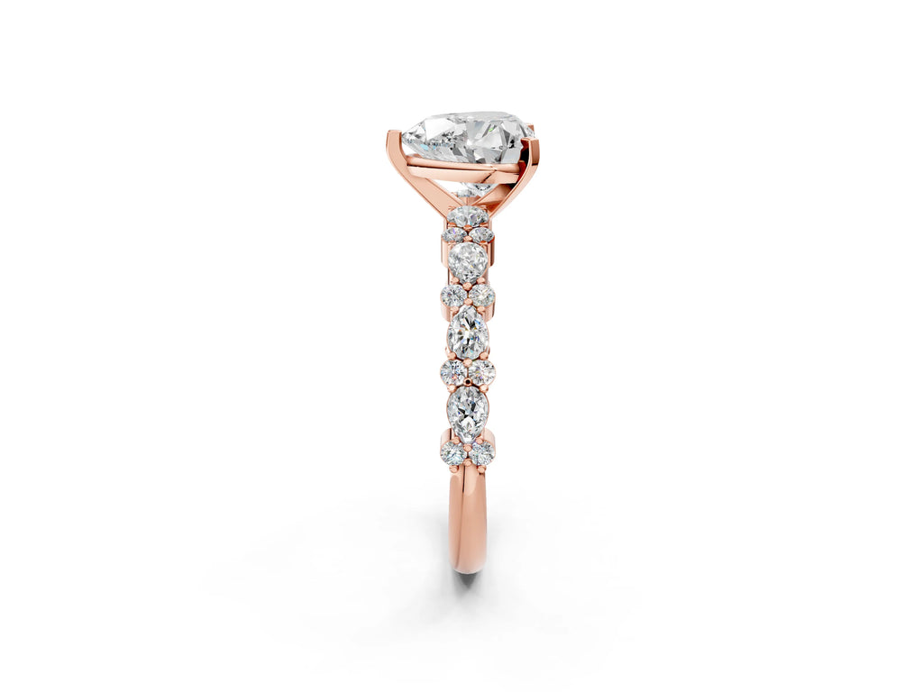 Heart Cut Diamond Solitaire Ring in Rose gold with Pear and Round Cluster Band