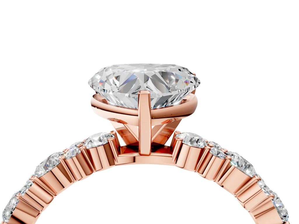 Heart Cut Diamond Solitaire Ring in Rose gold with Pear and Round Cluster Band