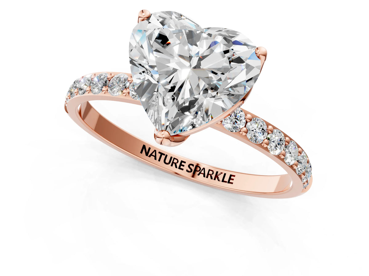Heart Cut Diamond Solitaire Ring in Rose gold with Round Shared Prong Pavé Band