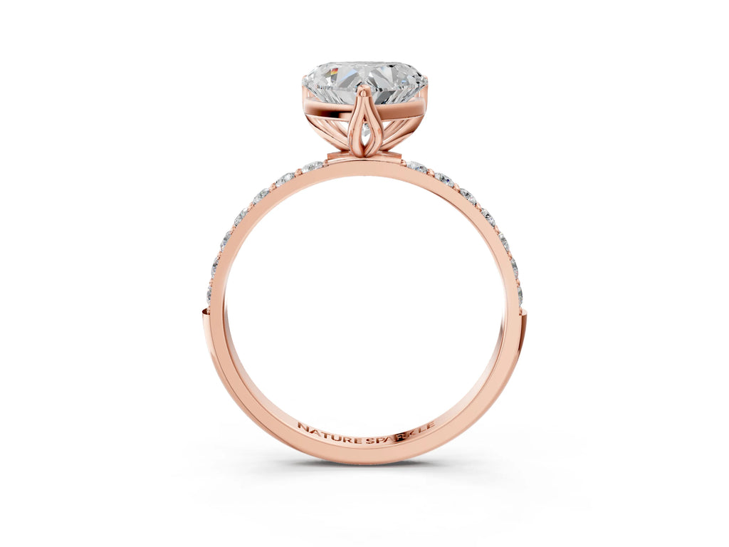 Heart Cut Diamond Solitaire Ring in Rose gold with Round Shared Prong Pavé Band