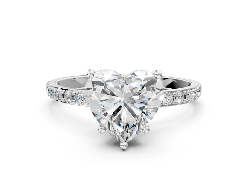 Heart Cut Diamond Solitaire Ring in Platinum with Round Pavé Band