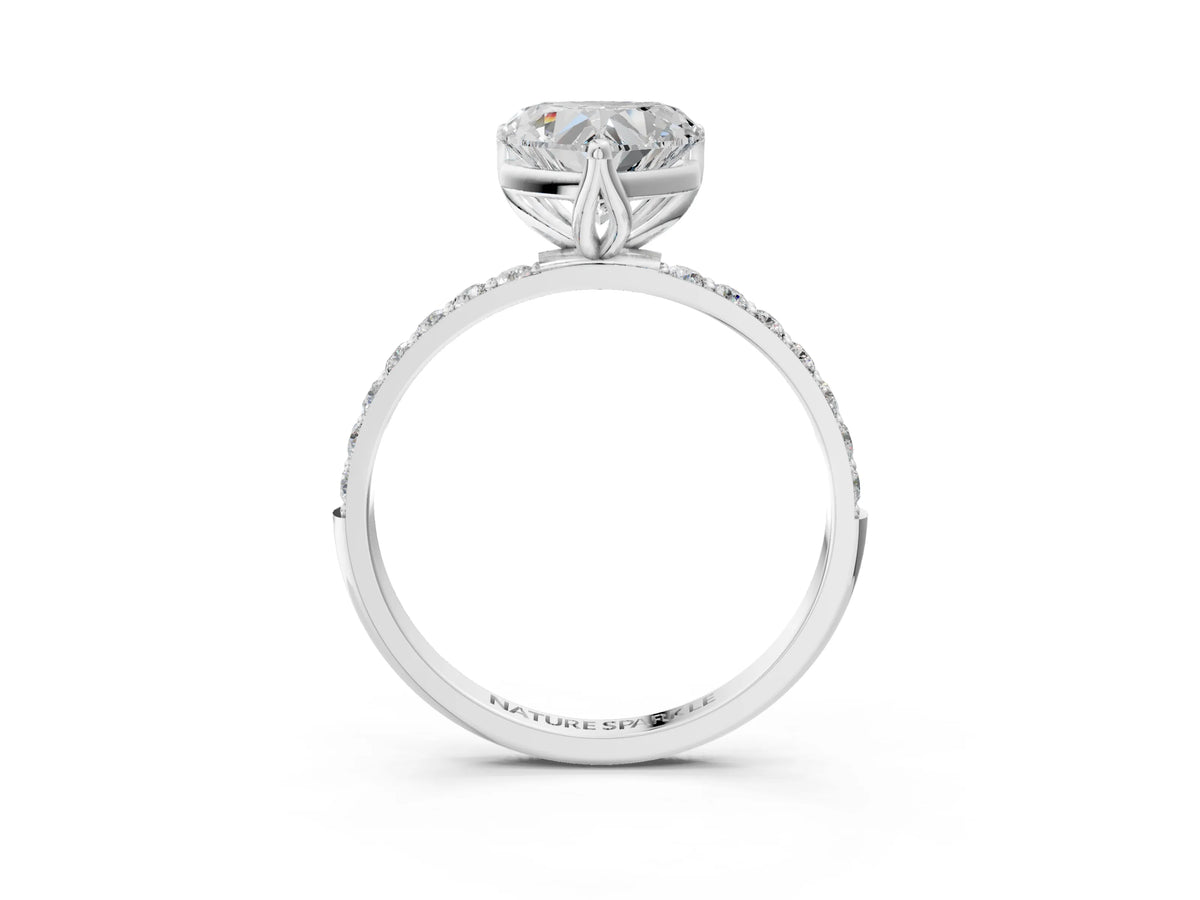 Heart Cut Diamond Solitaire Ring in Platinum with Round Shared Prong Pavé Band
