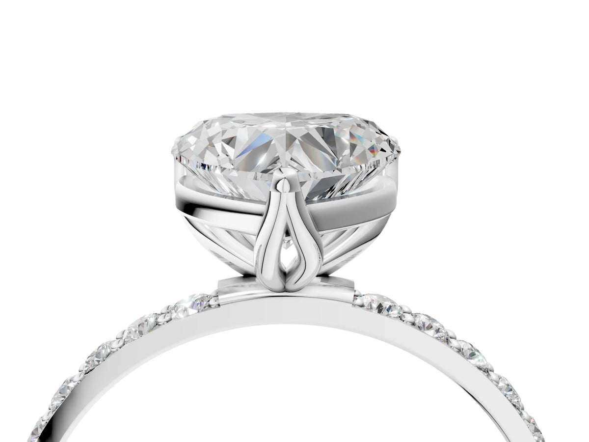 Heart Cut Diamond Solitaire Ring in Silver with Round Shared Prong Pavé Band