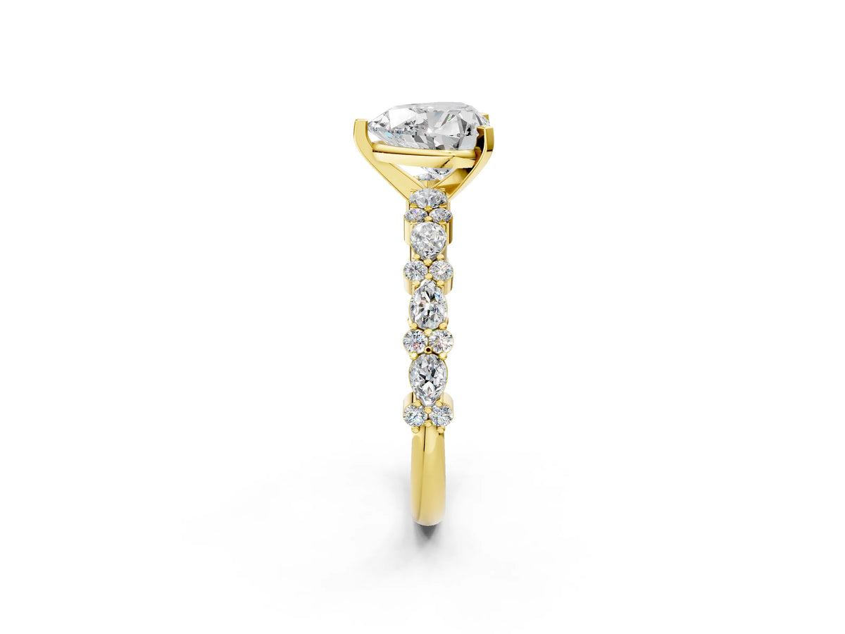 Heart Cut Diamond Solitaire Ring in Yellow gold with Pear and Round Cluster Band