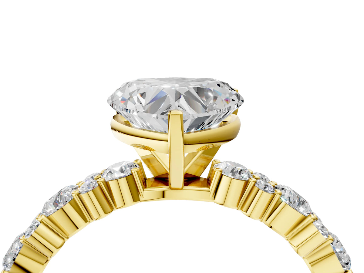 Heart Cut Diamond Solitaire Ring in Yellow gold with Pear and Round Cluster Band