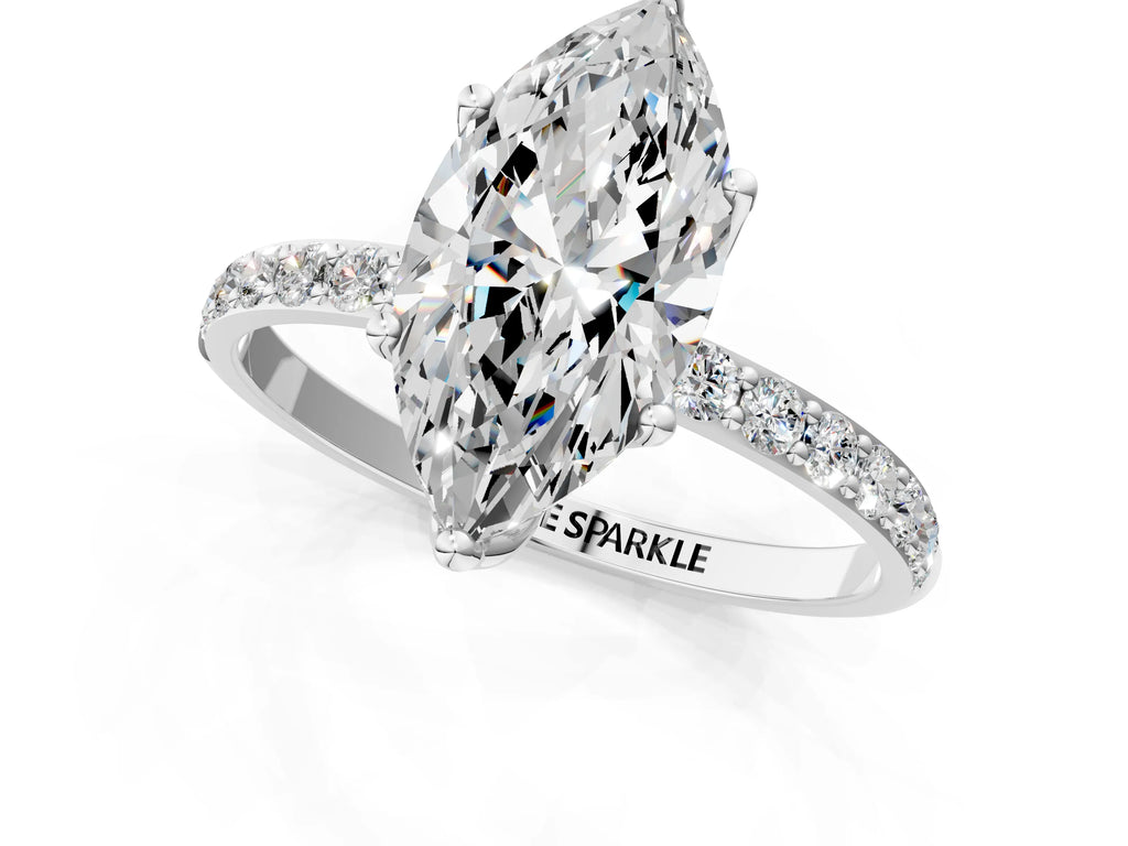 Marquise Cut Diamond Solitaire Ring in Platinum with Round Shared Prong Pavé Band