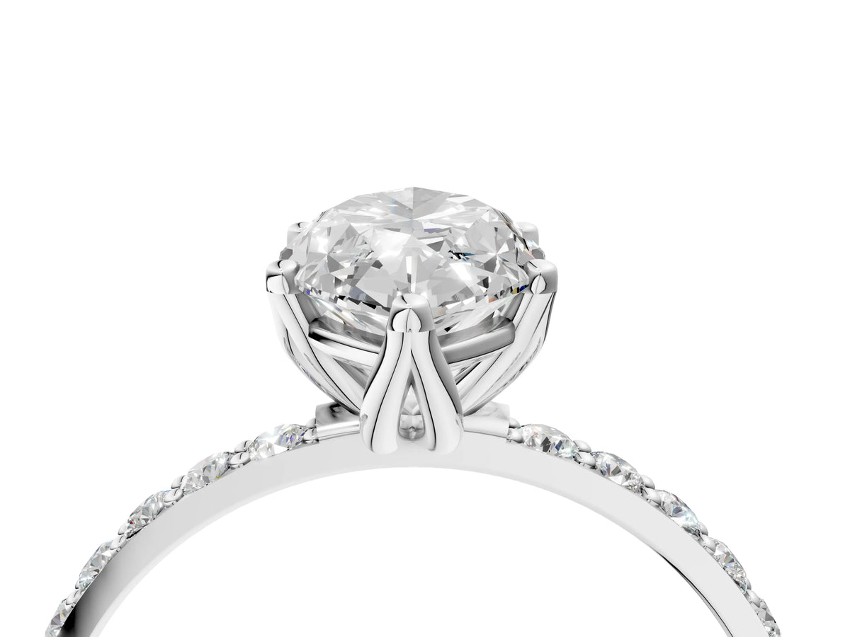 Marquise Cut Diamond Solitaire Ring in Platinum with Round Shared Prong Pavé Band