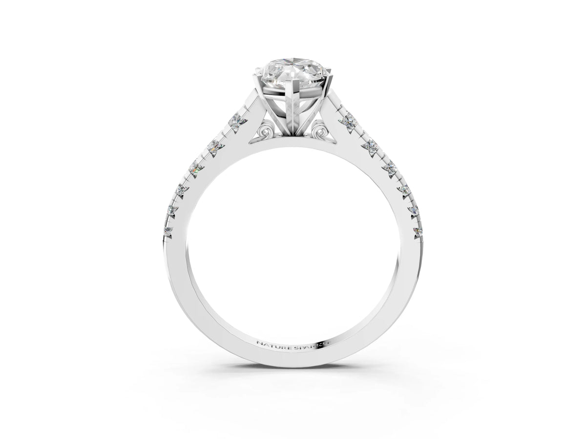 Marquise Cut Diamond Vintage Scroll Solitaire Ring in White gold with Graduated Round Side Stones