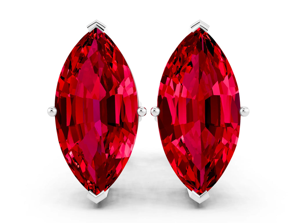 Marquise Cut Ruby Stud Earrings in White gold with Basket Setting