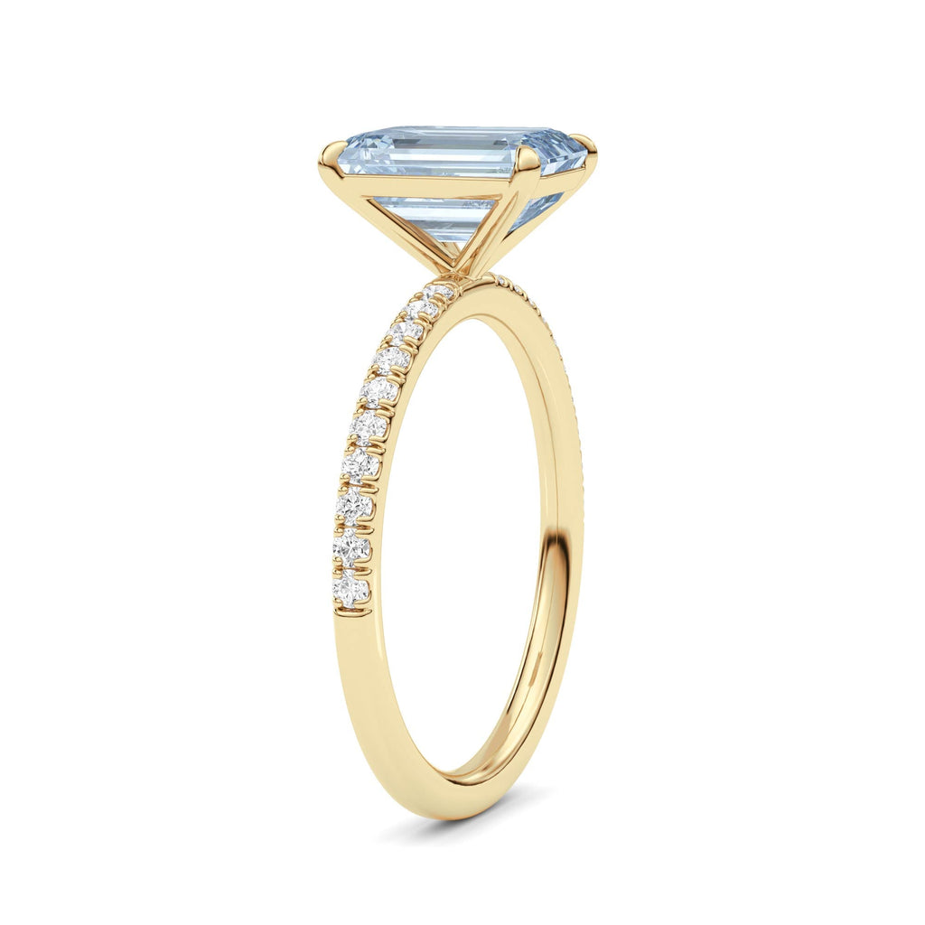 Yellow gold Fancy Blue Emerald Cut Diamond Solitaire with Pavé Band