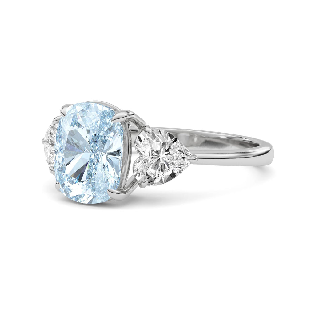 White gold Three-Stone Fancy Blue Cushion Cut Diamond Ring with Heart Side Stones
