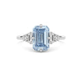 Silver Three-Stone Fancy Blue Emerald Cut Diamond Ring with Heart Side Stones