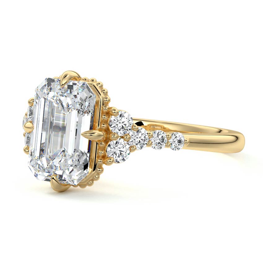 Yellow gold Emerald Diamond Side Stone Engagement Ring with Cluster Accents
