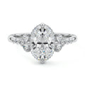 Platinum Oval Diamond Side Stone Engagement Ring with Cluster Accents