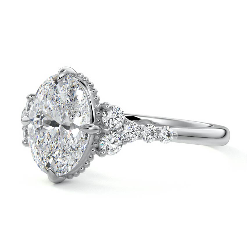 Platinum Oval Diamond Side Stone Engagement Ring with Cluster Accents