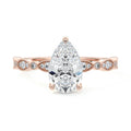 Rose gold Pear Diamond Side Stone Engagement Ring with Milgrain Marquise and Round Accents
