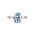 Rose gold Three-Stone Fancy Blue Oval Cut Diamond Ring with Tapered Baguette Side Stones