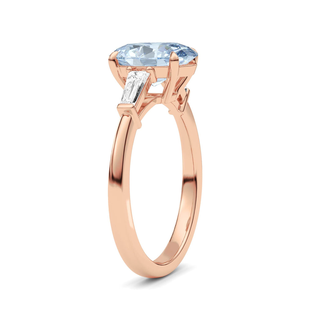 Rose gold Three-Stone Fancy Blue Oval Cut Diamond Ring with Tapered Baguette Side Stones